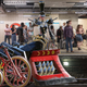 Bayonetta pulls into the Victoria Underground tube station platform.